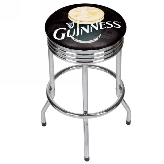 A Guinness Chrome Ribbed Bar Stool - Smiling Pint proudly displays a Guinness mug, catering to Guinness fans.