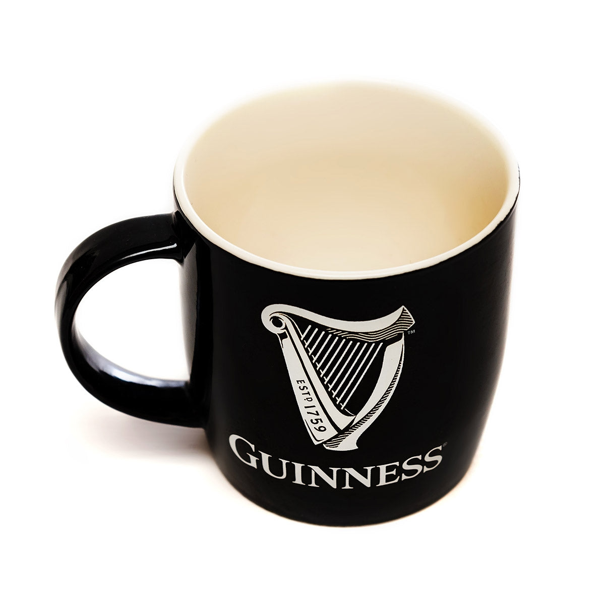 A Guinness Black Mug with White Harp Logo is displayed on a white background.