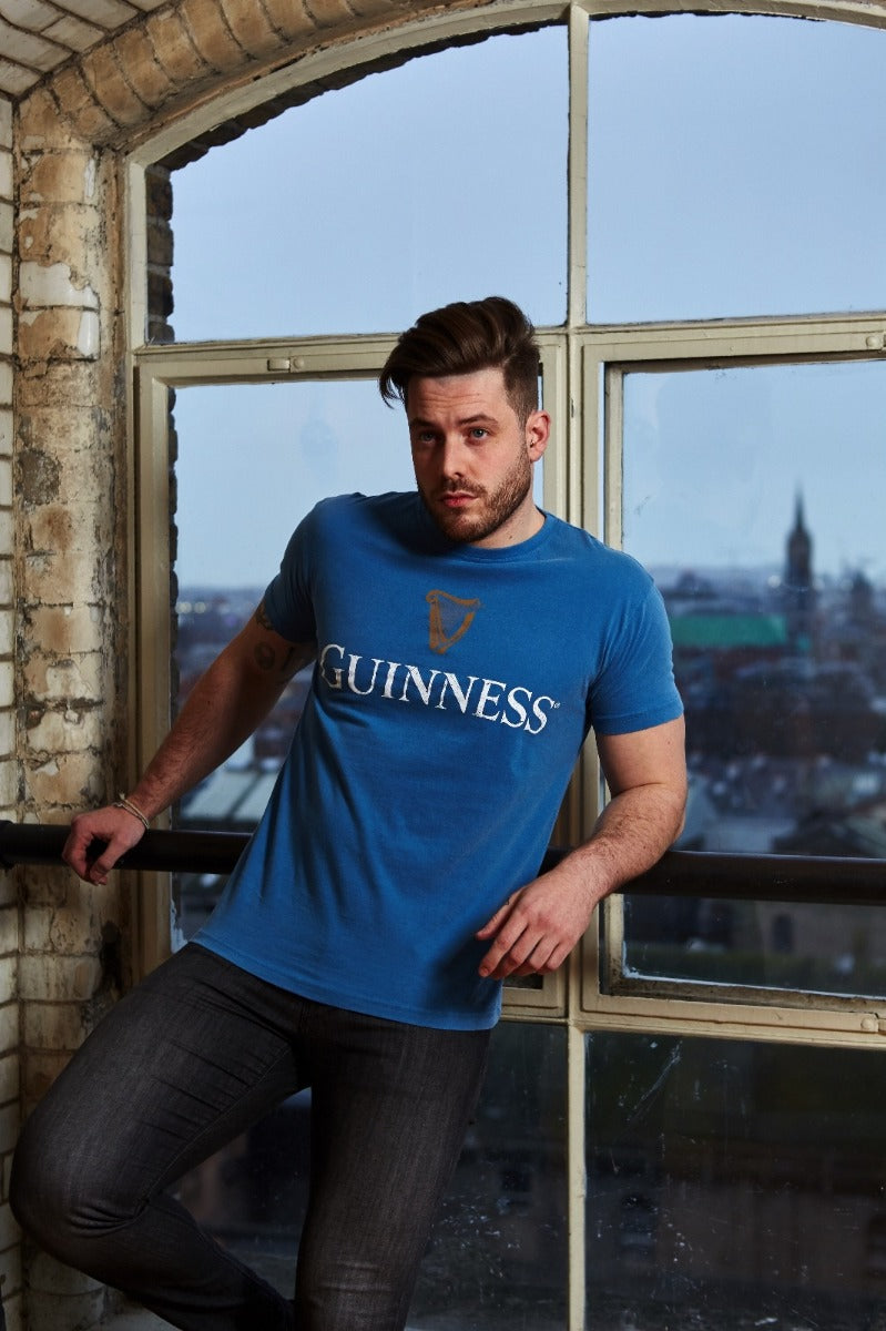 Men's Guinness Trademark Label T-Shirt Blue with Guinness brand.