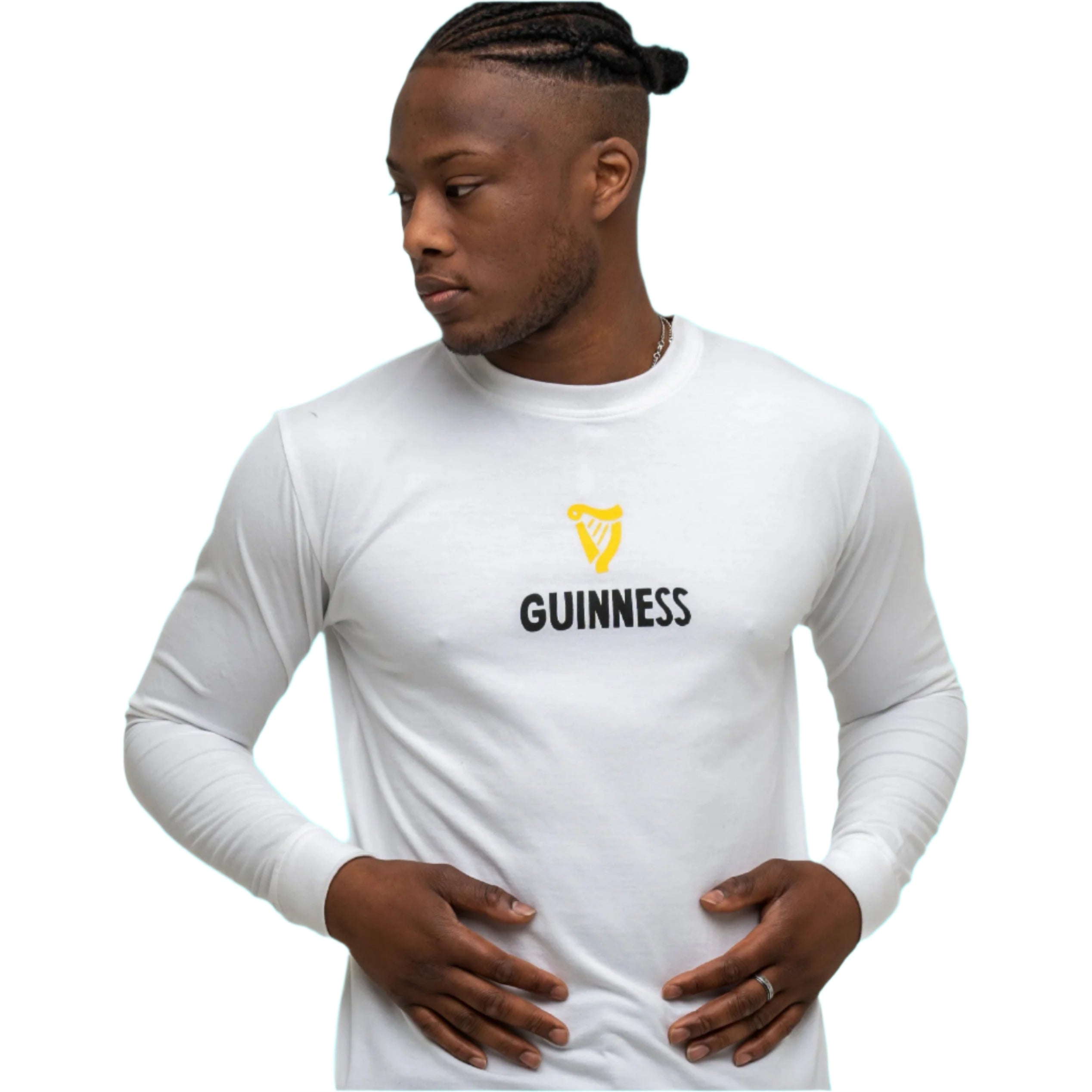 A man models the white Guinness Seb Curi Lovely Day Longsleeve Tee by Guinness Webstore US, which features a yellow Guinness logo and text on the front, standing against a plain white background.