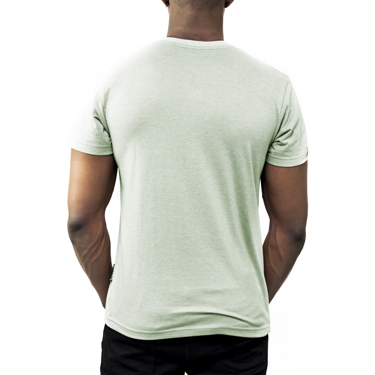 The back of a man wearing a Guinness Green Bottle Cap Tee.
