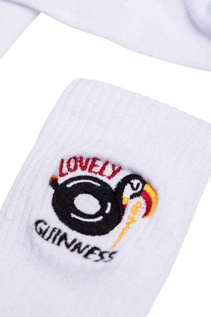 Stylish FATTI BURKE "LOVELY DAY FOR A GUINNESS" TOUCAN white socks, both comfy and stylish.