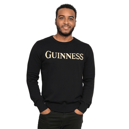 A man sporting a black sweatshirt branded with the word Guinness has been replaced with "A man sporting a black sweatshirt branded with the words Guinness 100% Organic Cotton Jumper.