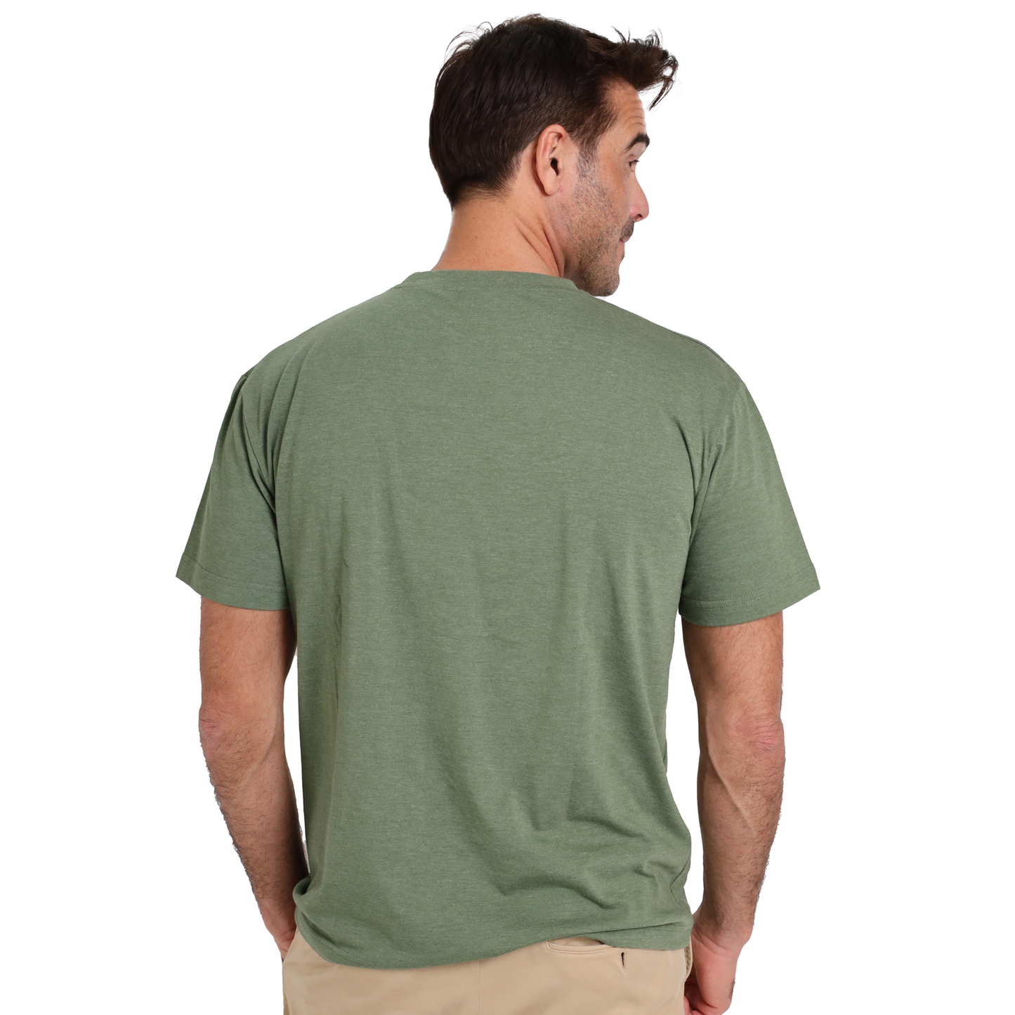 Man with short dark hair wearing a Guinness Green Distressed Label Tee made from cotton blend fabric and beige pants, facing away from the camera.