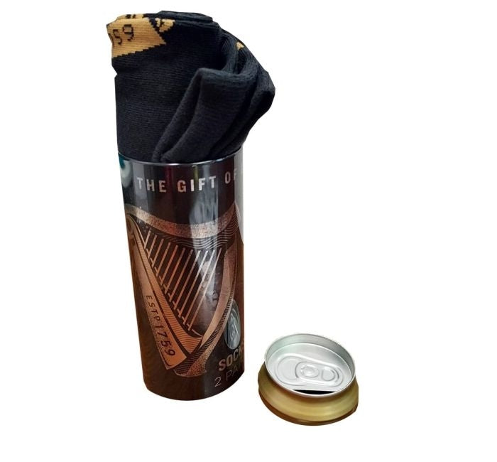 A cozy black Guinness Harp Socks In A Can (2 Pack), perfect as a gift.