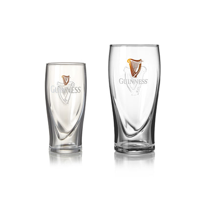 A 12 pack of Guinness Half Pint Glasses on a white surface.