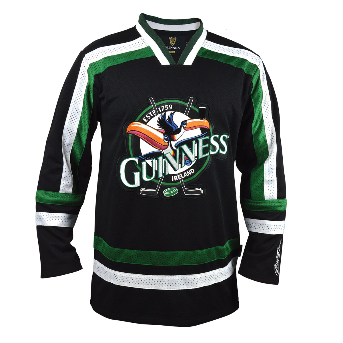 The Guinness Toucan Hockey Jersey Black and Green by Guinness features a toucan holding a hockey stick, crossed sticks, the iconic logo, plus white mesh accents on the sleeves and sides.