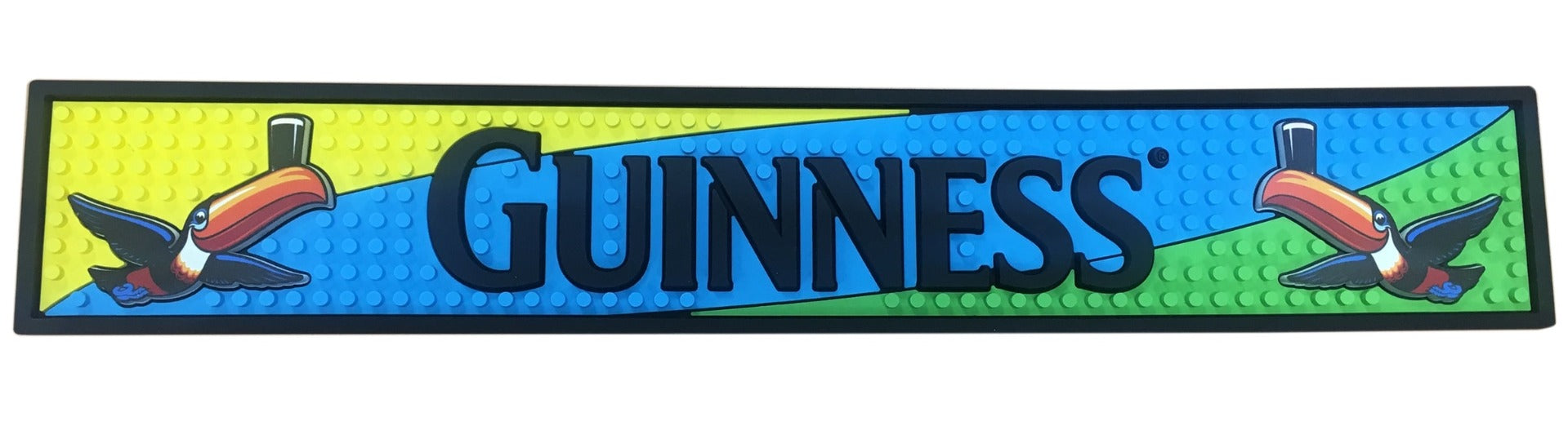 The Guinness Toucan PVC Bar Mat is displayed on a vibrant bar mat for your home bar.