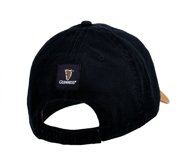 A Guinness Black & Caramel Cap with Leather Patch made of cotton.