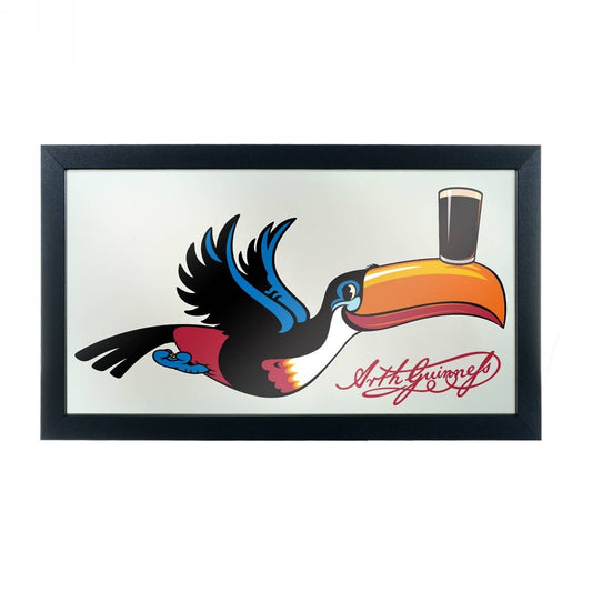 A Guinness framed mirror with an image of a toucan on it.