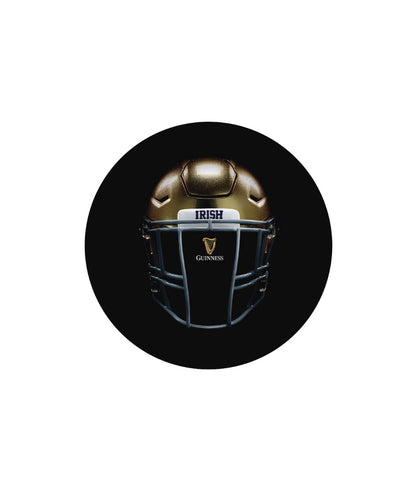 A Notre Dame Helmet Swivel Black Bar Stool emblazoned with the Guinness logo stands out on a dark background.