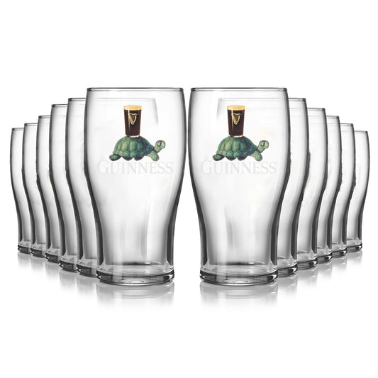 The Guinness Gilroy Tortoise Pint Glass - 12 Pack from Guinness Webstore US includes twelve clear 20oz glasses, each featuring the classic Gilroy Tortoise carrying a pint of Guinness on its shell.