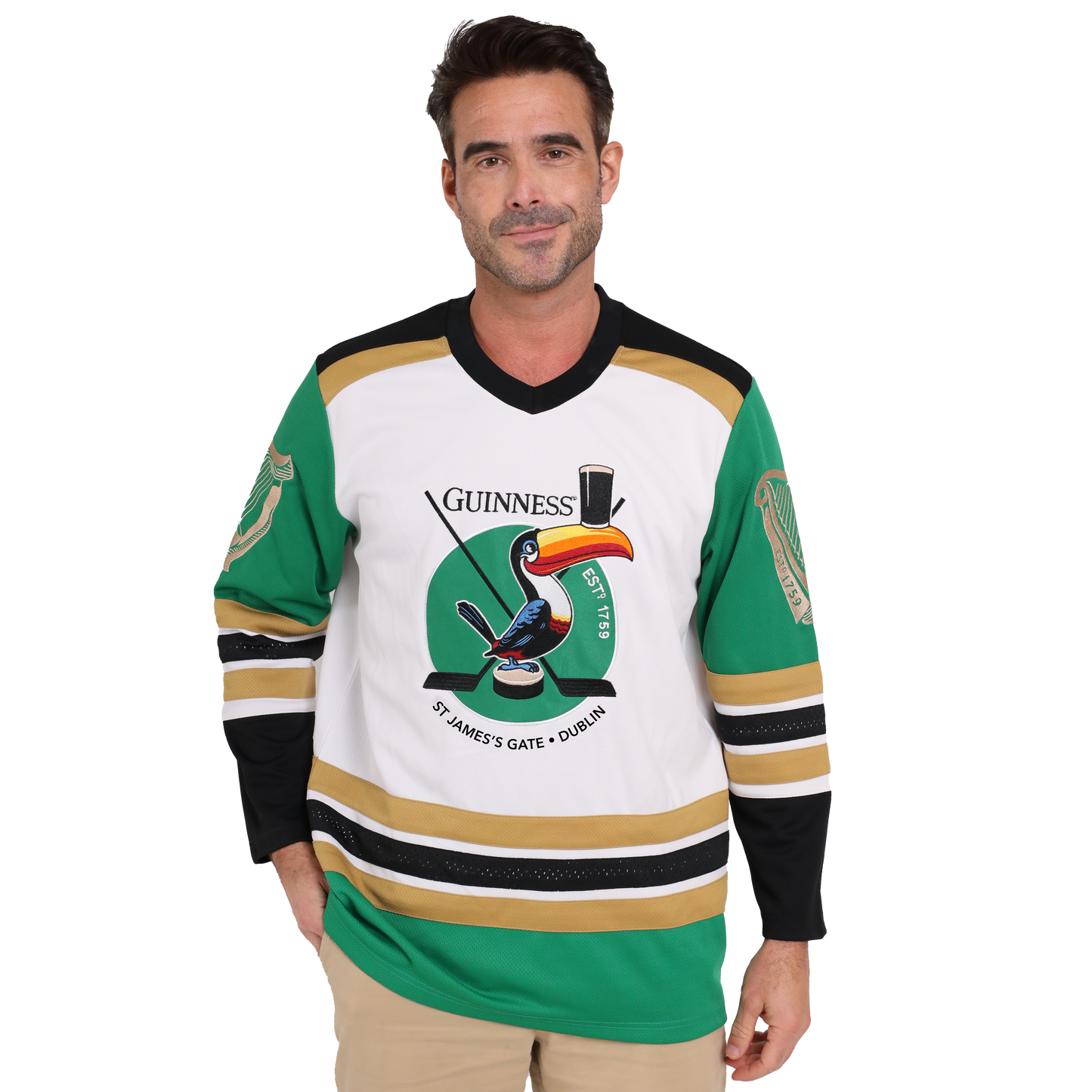 A man donning a Guinness hockey jersey made from sustainable materials and featuring the iconic Guinness Toucan graphic.