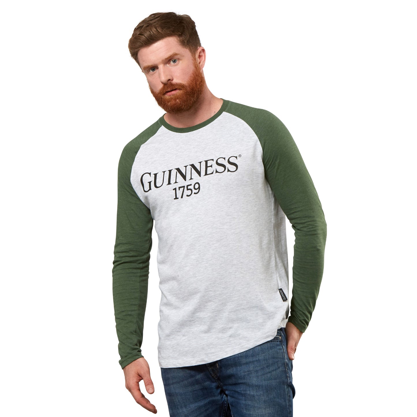 A man wearing a Guinness baseball t-shirt.