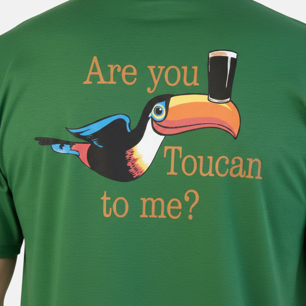 The Guinness Are you Toucan to Me Tee - Green from Guinness Webstore US features the classic Gilroy toucan with a pint, plus "Are you Toucan to me?" above and below the playful design.