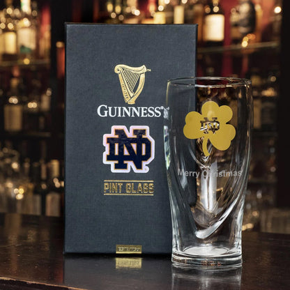 Guinness Notre Dame pint glass.

Revised sentence: Notre Dame Guinness Shamrock 16oz Pint Glass.