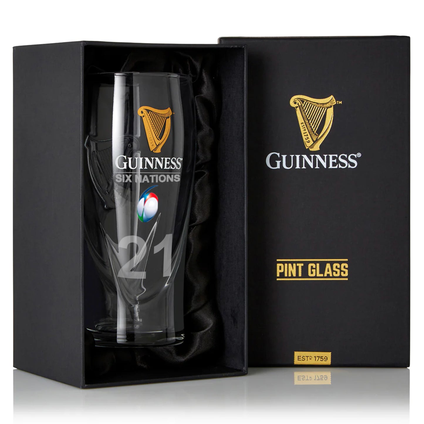 The Guinness Webstore US Six Nations Pint Glass features the iconic Harp Logo and "21" on the front, ideal for rugby fans. Comes in a stylish black gift box marked "Pint Glass.