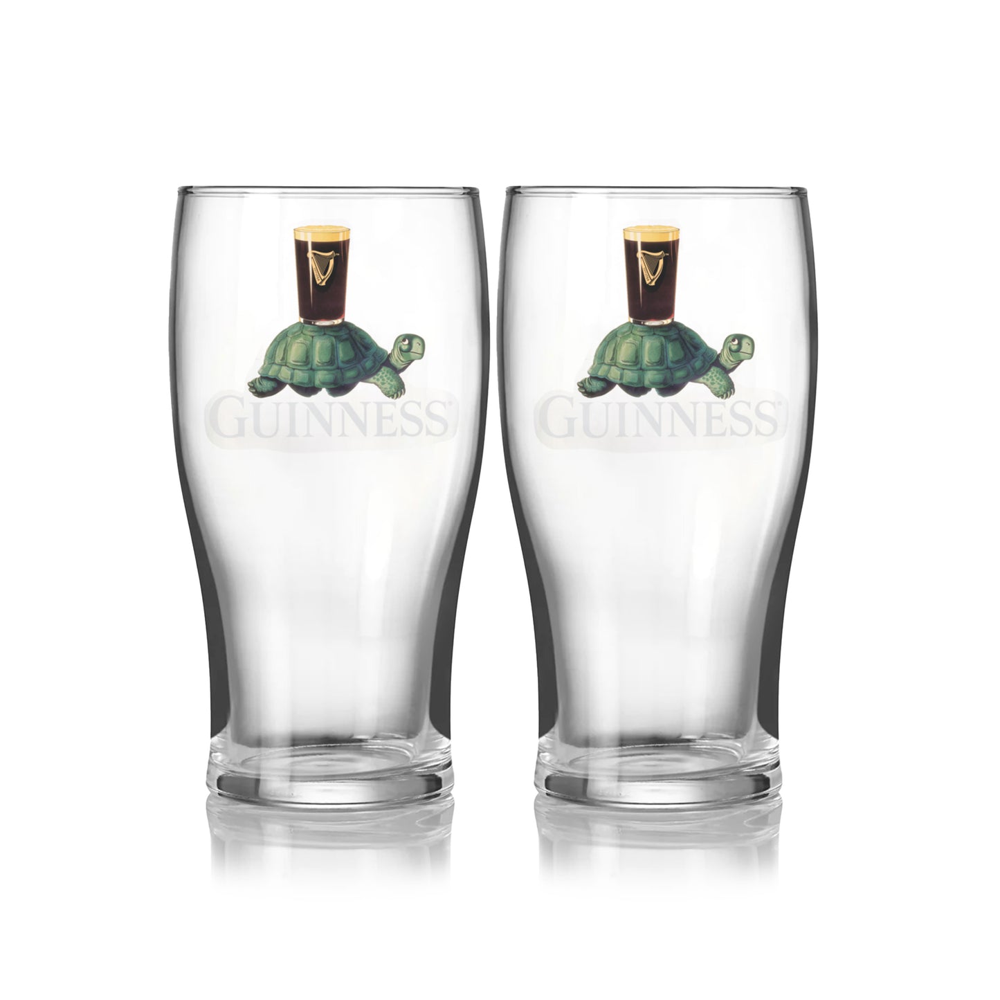 The Guinness Gilroy Tortoise Pint Glass - 2 Pack from Guinness Webstore US features two clear glasses with the iconic Gilroy tortoise carrying a pint and the classic Guinness logo on the front.