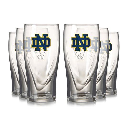 A set of six Guinness Notre Dame 16OZ Pint Glasses with a logo on them.