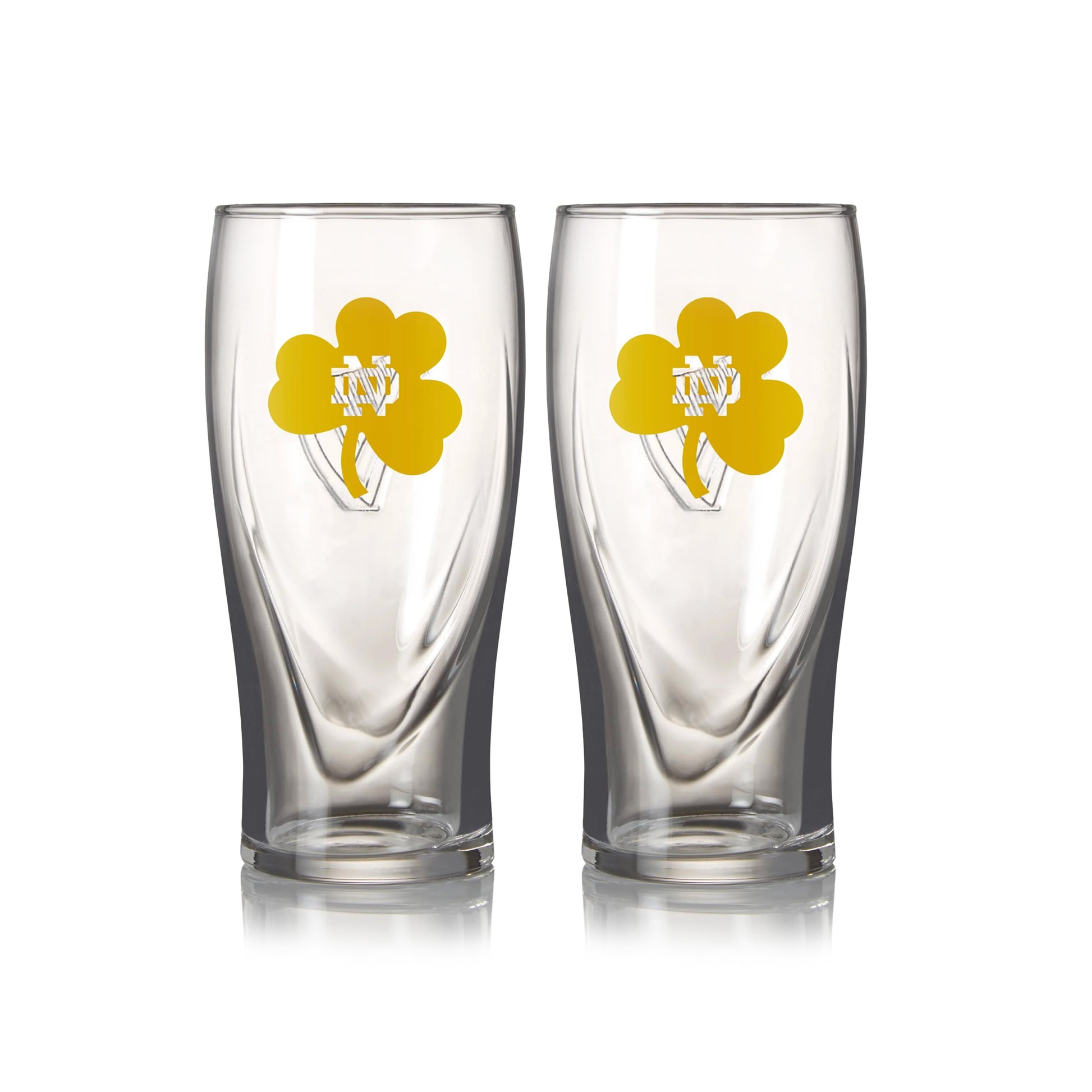 Two Notre Dame Guinness Shamrock 16oz Pint Glasses with two shamrocks on them.