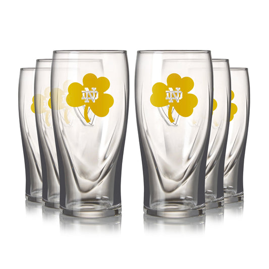 Six Notre Dame Guinness Shamrock 16oz Pint Glasses on a white background.