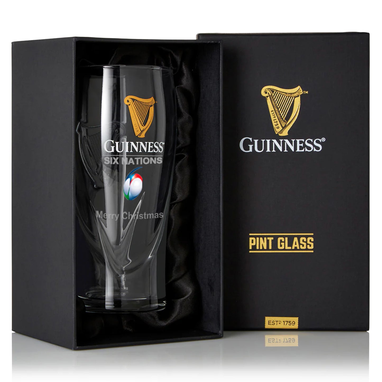 The Guinness Six Nations Pint Glass - 2 Pack from Guinness Webstore US comes in sleek black packaging with gold harp and "Merry Christmas" logos—a perfect gift and must-have for rugby fans.