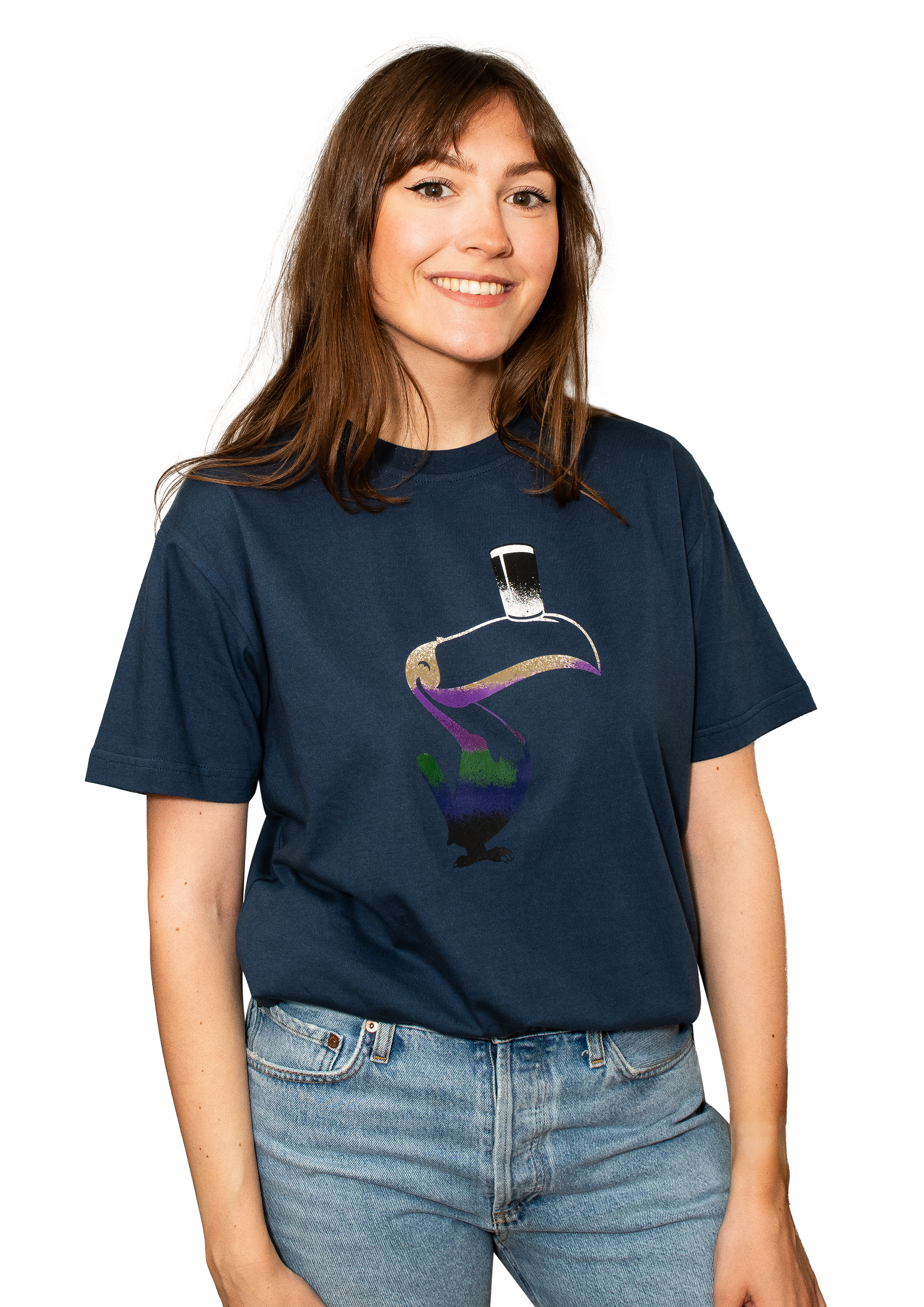 A person wears a Guinness Liquid Toucan Tee - Blue, designed with BCI cotton, showcasing a vibrant Liquid Toucan graphic that enlivens the navy blue fabric.