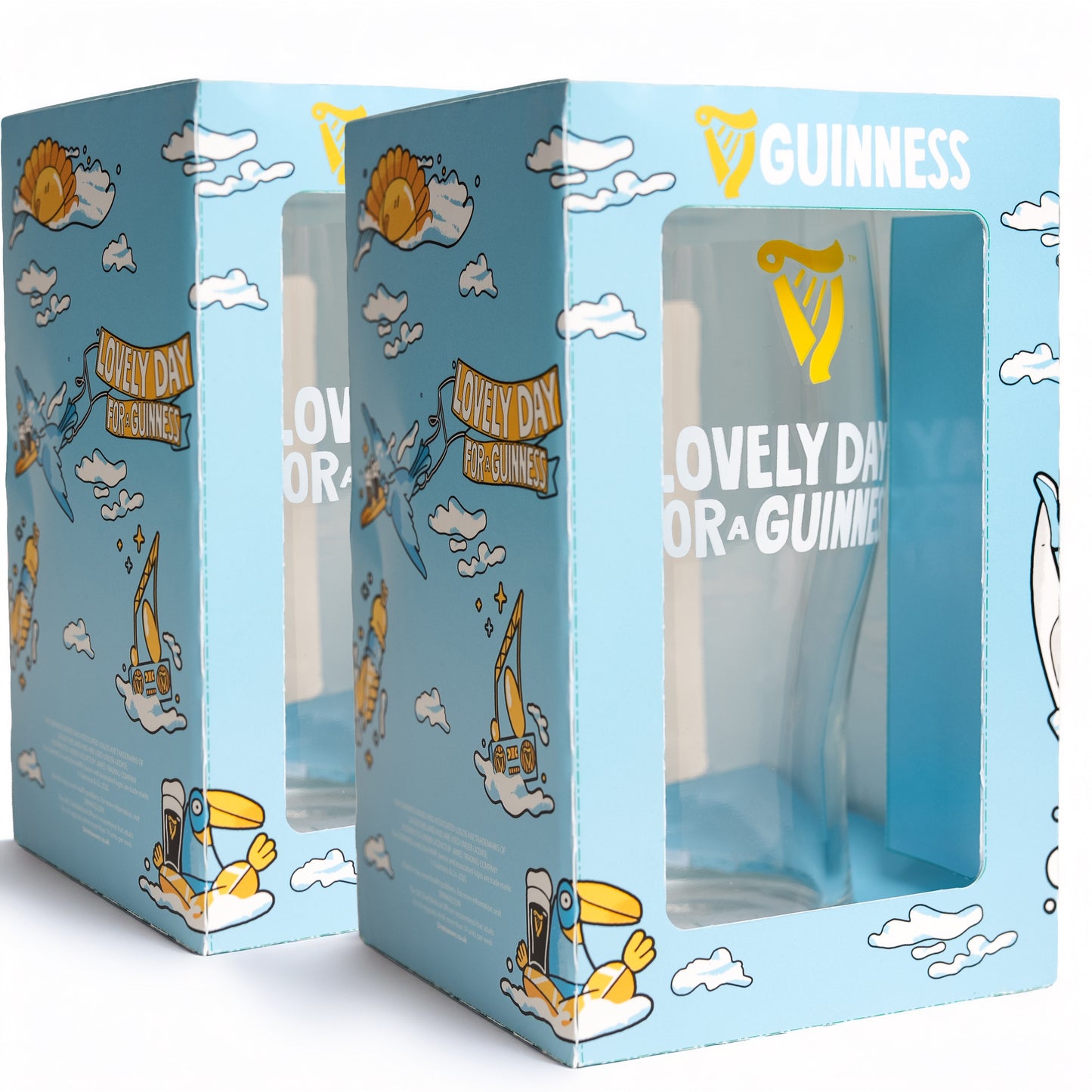 The Guinness Seb Curi Lovely Day Pint Glass 2 Pack from Guinness Webstore US features collector's edition glasses with cartoon birds, sailboats, clouds, and "Lovely day for a Guinness" text. Art by Sebastian Curi.