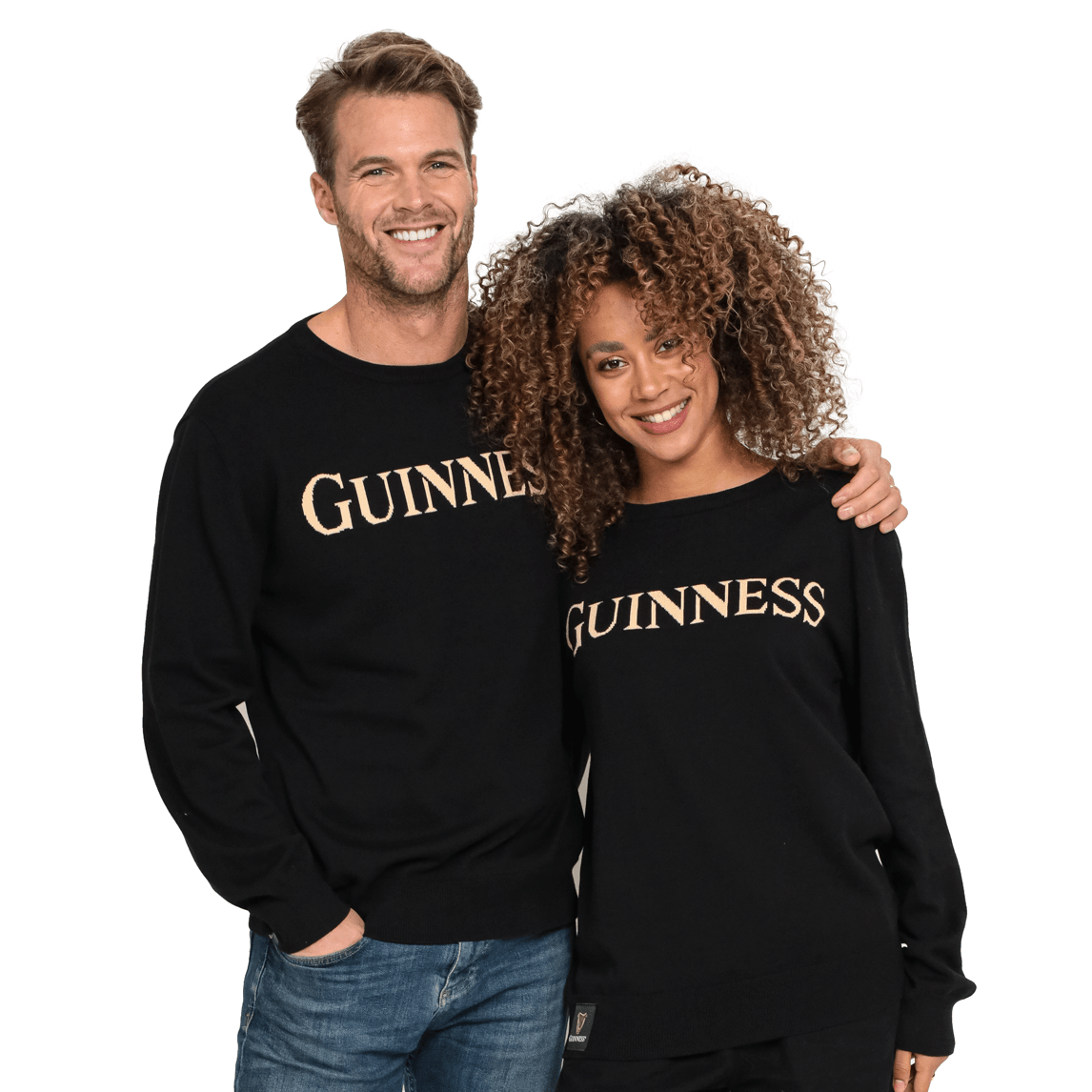 A man and woman wearing Guinness 100% Organic Cotton Jumpers made by Guinness.