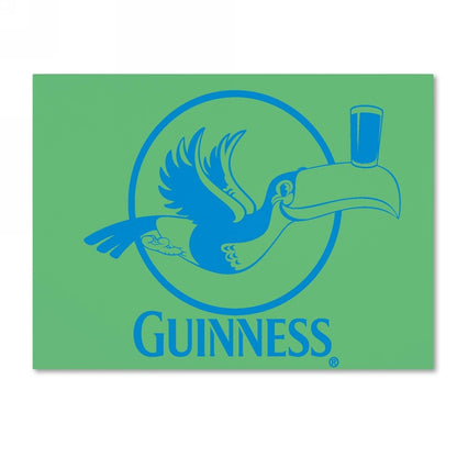 A vibrant Guinness Brewery 'Guinness XVI' canvas art featuring a green and blue sign with a bird and a glass of Guinness beer.
