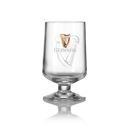 An embossed Guinness Embossed Stem Glass on a white background.