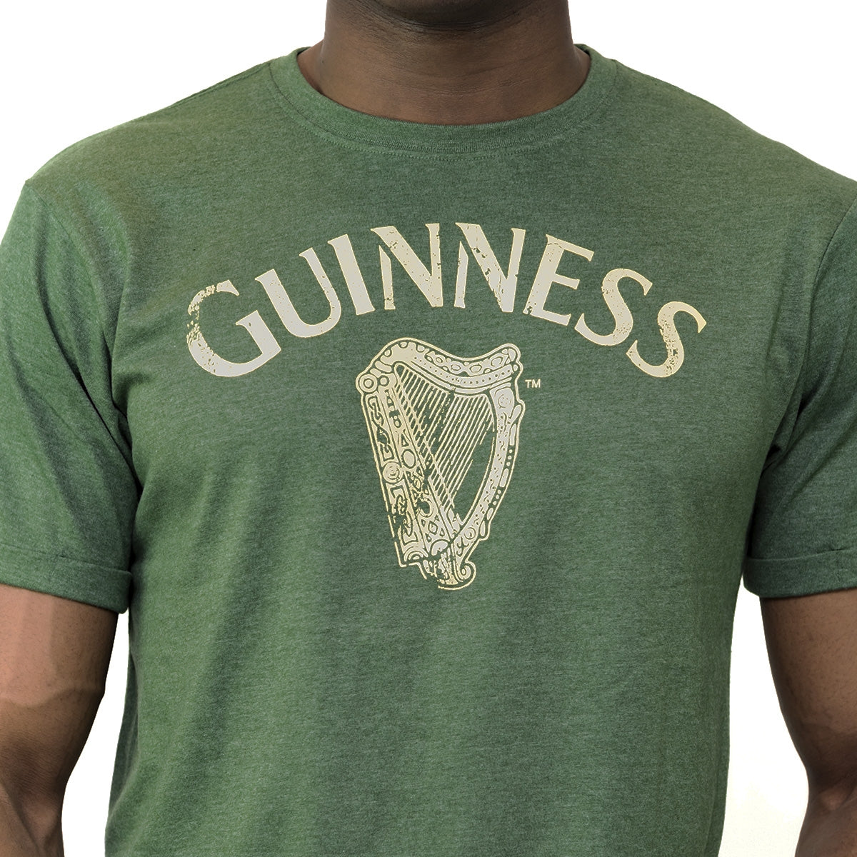 A man wearing a Guinness Vintage Harp Tee.