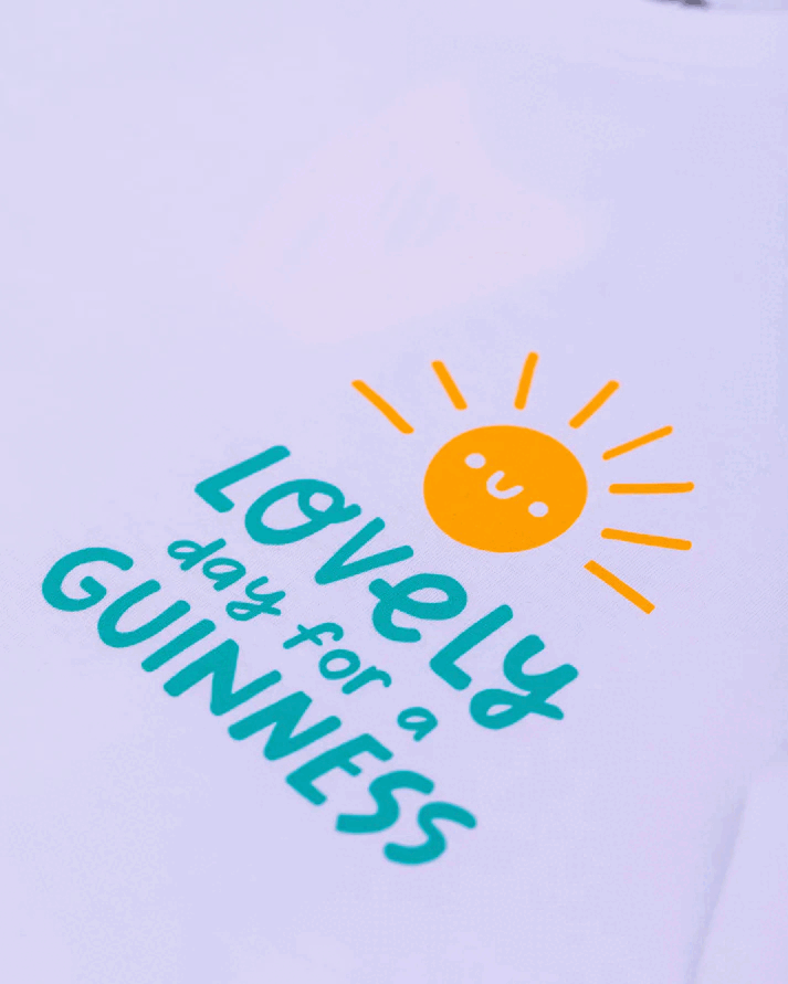 Lovely white FATTI BURKE "LOVELY DAY FOR A GUINNESS" ICE CREAM TEE mockup for a Guinness.