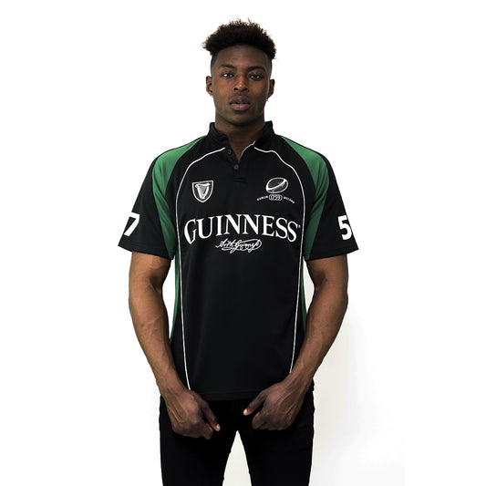 A man wearing a Guinness Short Sleeve Performance Rugby Jersey.