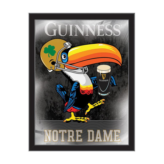 A Guinness Notre Dame Toucan Wall Mirror - 26"x15" holding a Guinness beer.