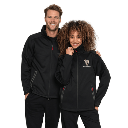 A man and woman posing for a photo in a Guinness Soft shell Waterproof Jacket coated with TPU coated polyester.