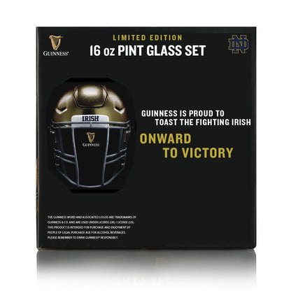 A Notre Dame Guinness 16oz Pint Glass 2 Pack with a helmet on it, perfect for Notre Dame football fans.