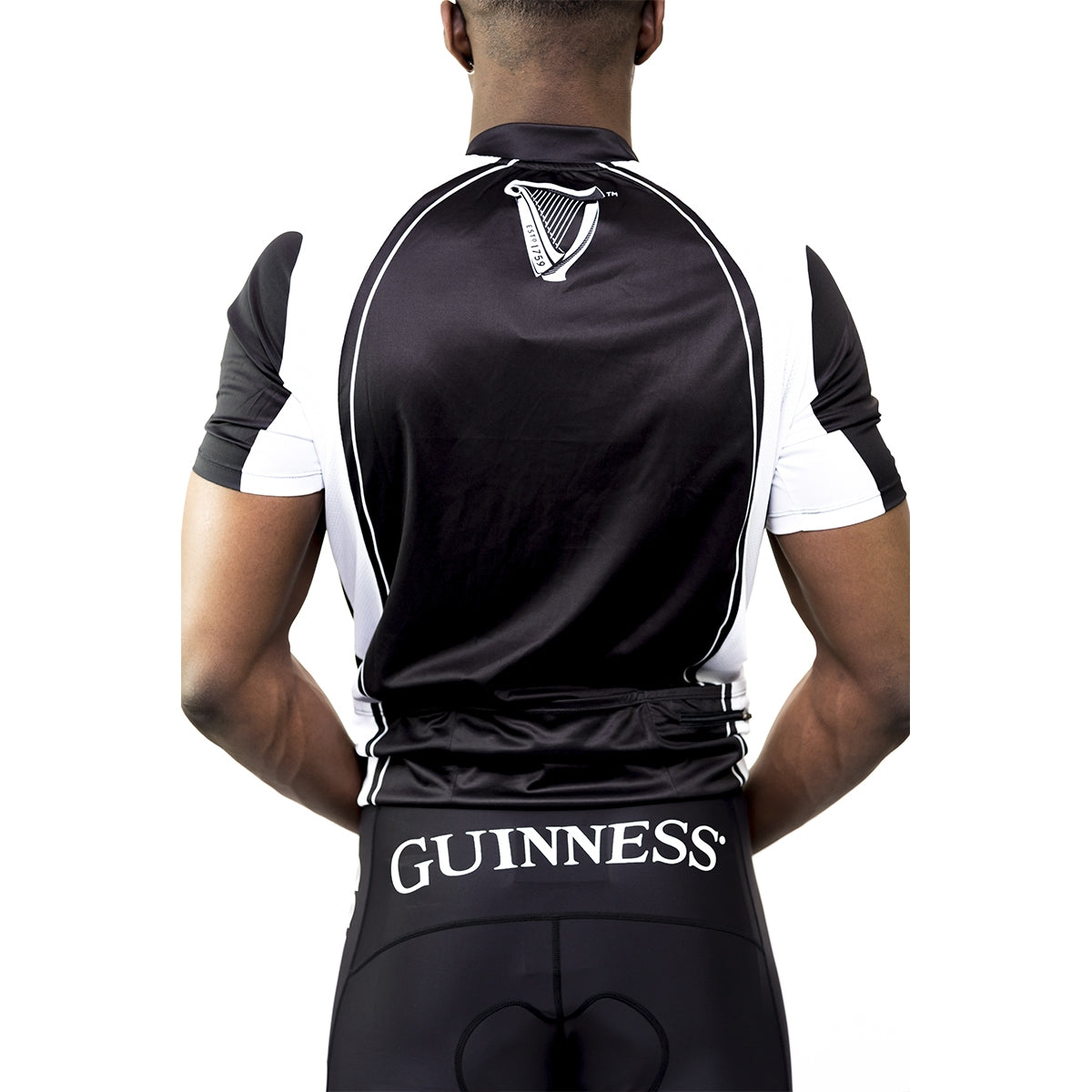 The back of a man wearing a Guinness Performance cycling jersey is a perfect combination of performance and style.