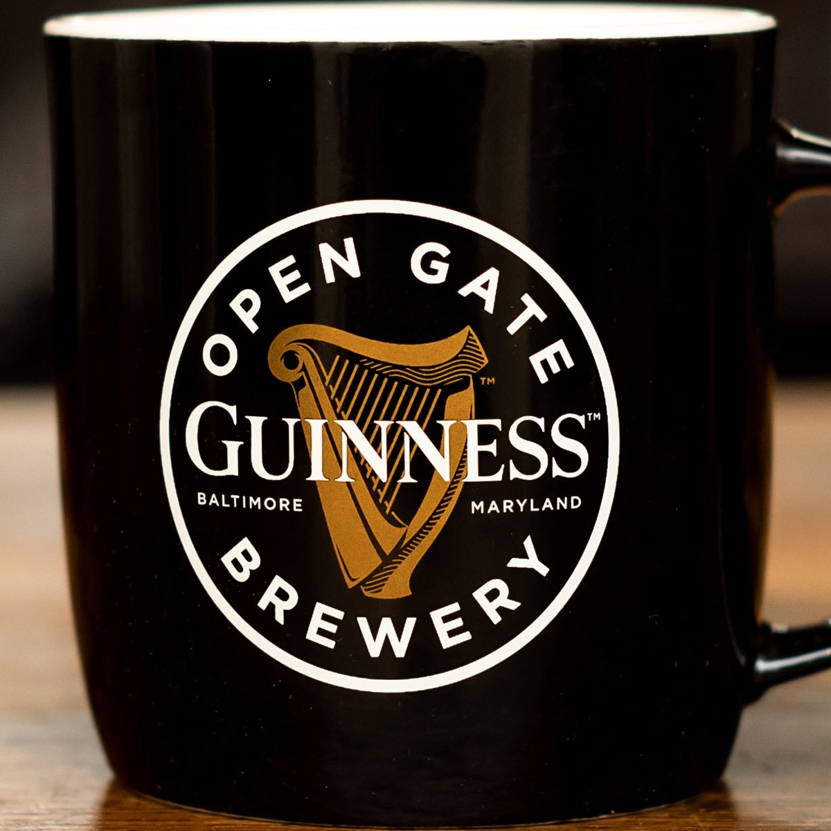 Open Guinness Open Gate Brewery Black Ceramic Mug with logo.