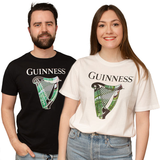 Two people wearing the Guinness St. Patrick's Day Limited Edition T-Shirt Collection, featuring the iconic harp logo.