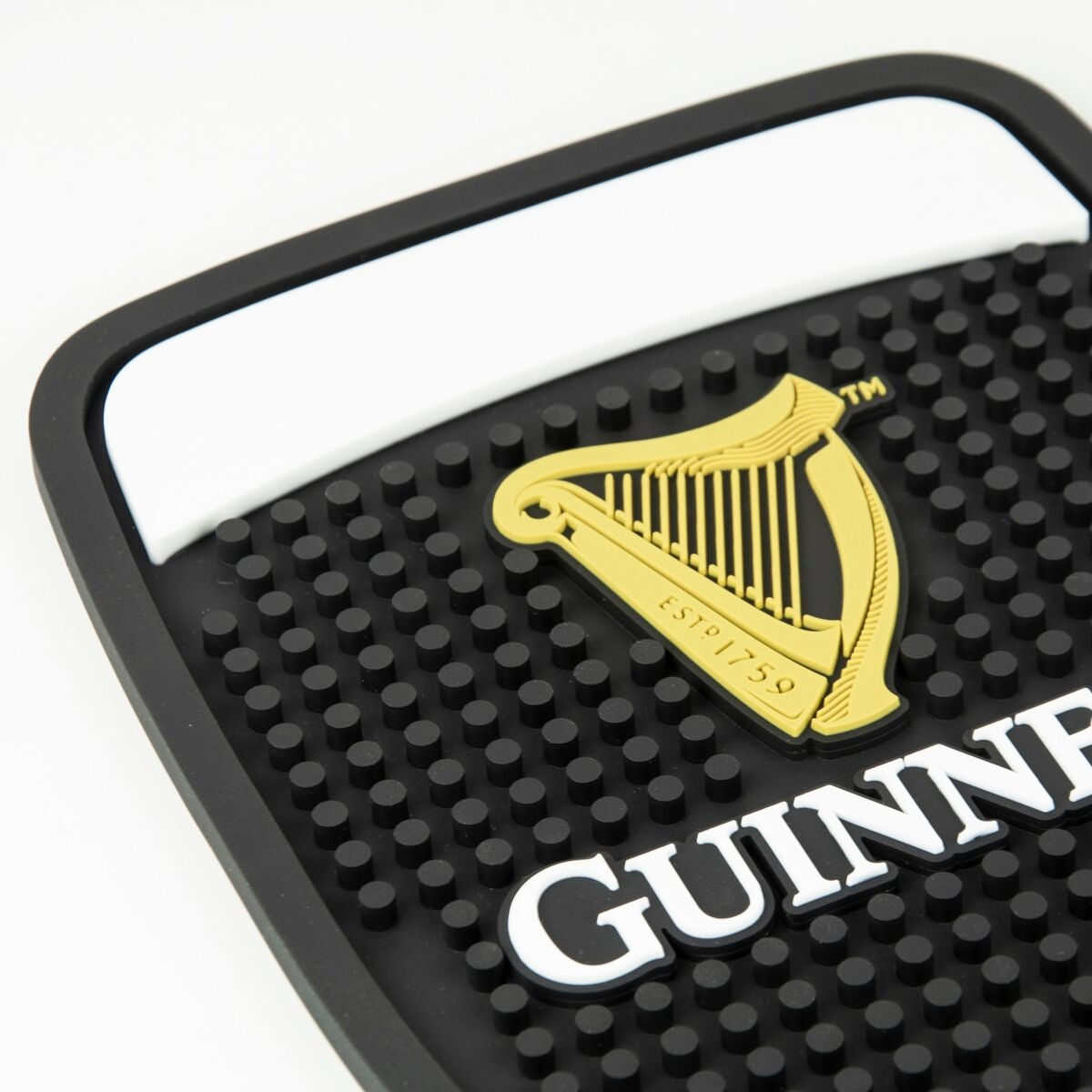 Guinness logo on a Guinness PVC Pint shape Bar Mat.