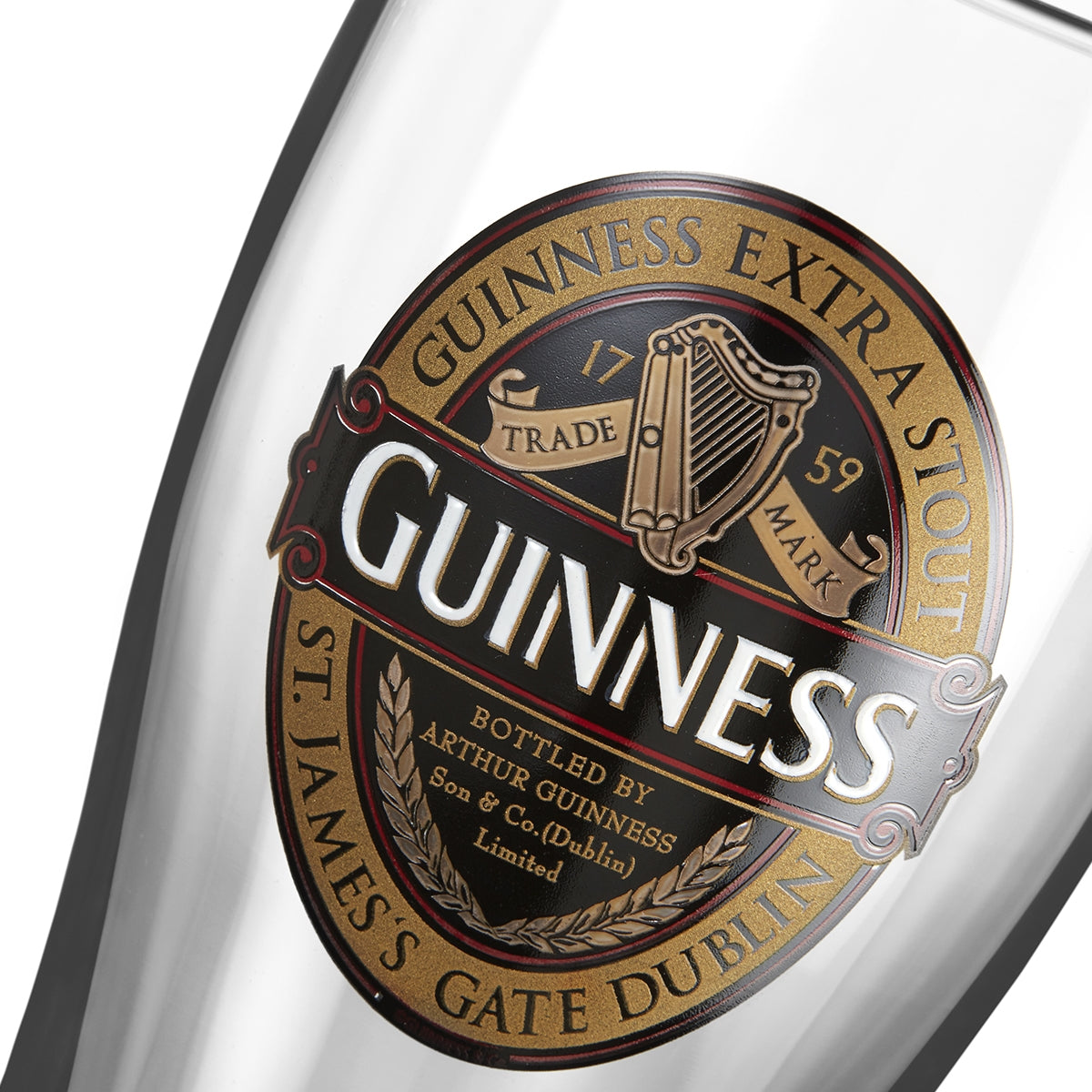 A close up of a Guinness Classic Pint Glass Twin Pack, official merchandise.