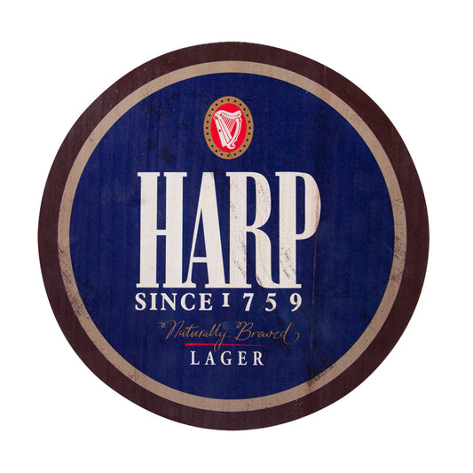 Guinness Harp Wooden Bottle Top Wall Art by Guinness features a dark blue background, "Since 1759," and "Naturally Brewed" text with a red harp emblem—perfect for vintage home decor or pairing with Guinness collectibles.