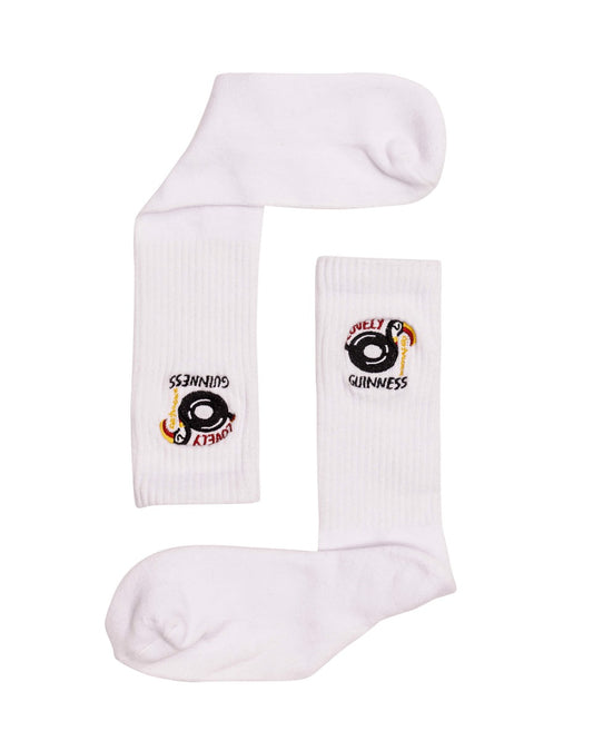 Stylish and comfy Guinness "Lovely Day for a Guinness" Toucan white socks with an eye on them.