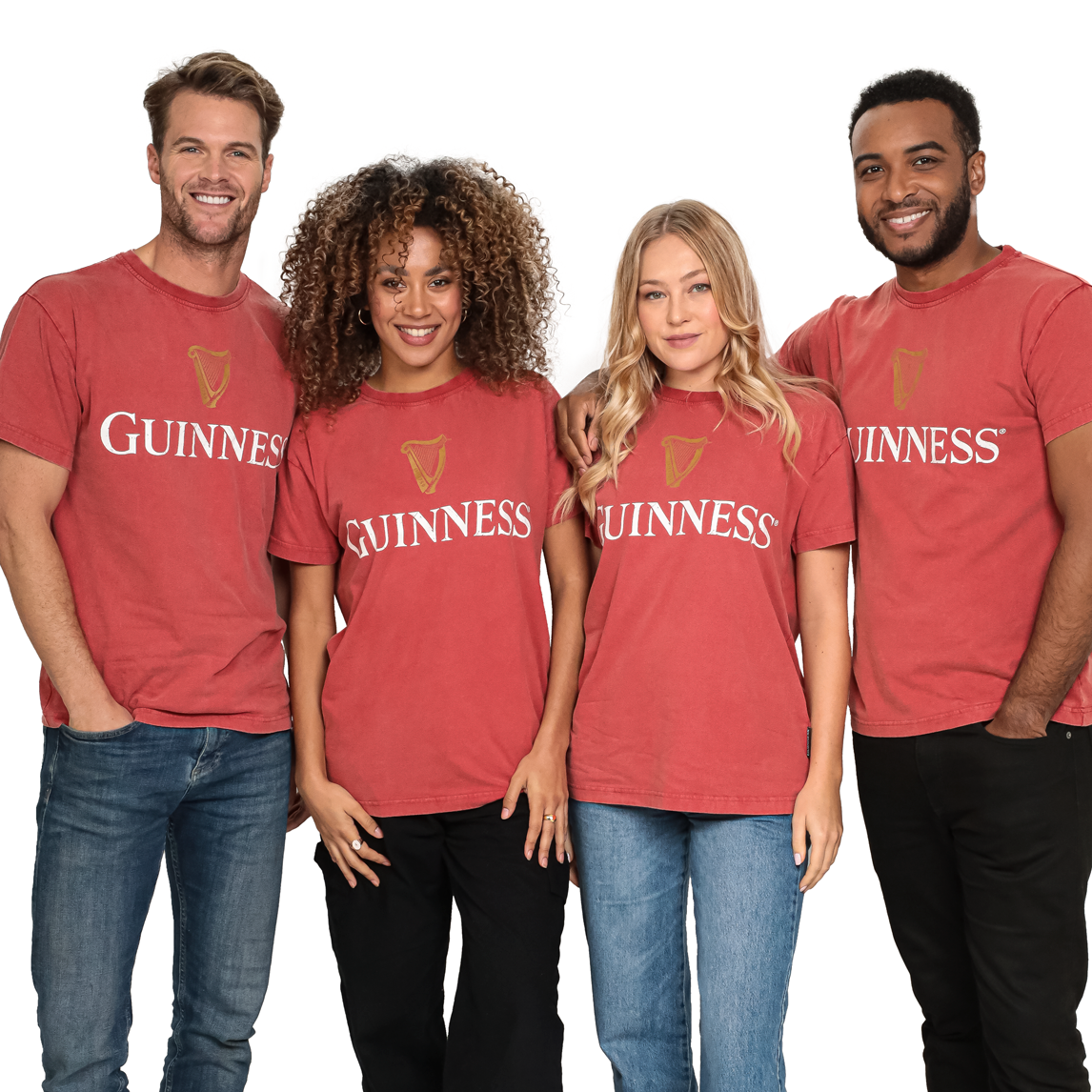 Four people proudly wearing Guinness PREMIUM HARP RED TEEs.