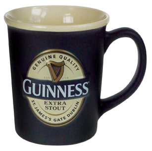 The Guinness Large Label Embossed Mug, a black mug adorned with the Guinness logo and harp emblem along with the "St. James's Gate Dublin" text, captures the essence of Irish Stout tradition. Expertly designed for enthusiasts, it's as though you're holding Arthur Guinness's signature every morning.