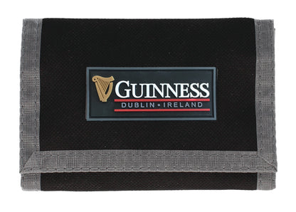 The Guinness Webstore US Sports Wallet features a PVC logo and gray trim—a stylish black wallet perfect for fans and collectors of Guinness.