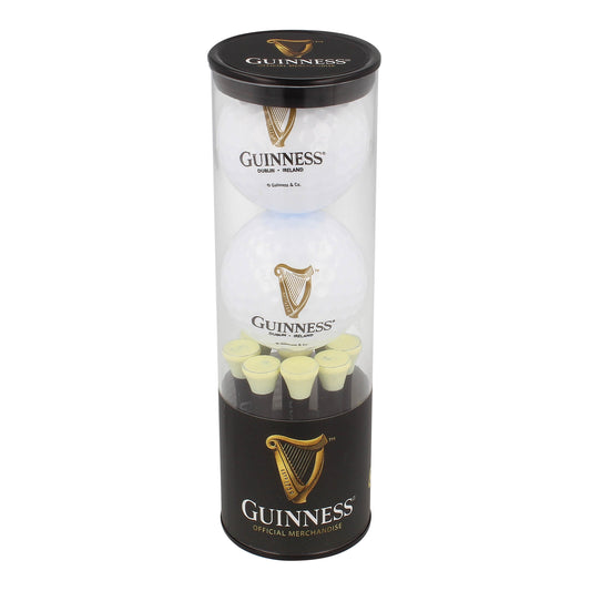 A clear cylindrical container holds a Guinness Golf Balls and Tee Set, including two white Guinness Golf Balls and six yellow tees. The Guinness logo and branding are prominently displayed on the container.