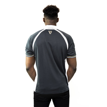 The back view of a man wearing a Guinness Made of More Rugby Jersey.