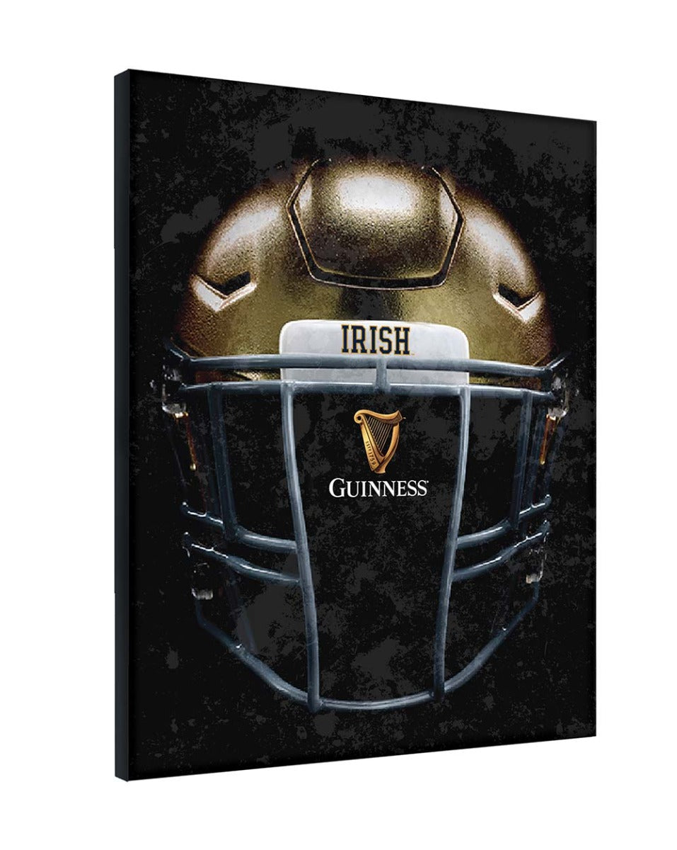 This Guinness Notre Dame Helmet canvas wall art showcases an Irish football helmet on a sleek black background.